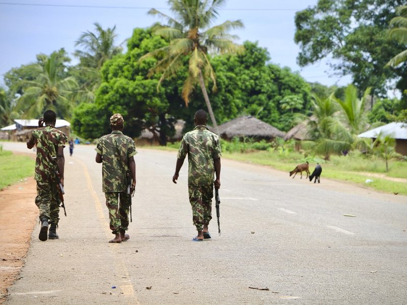 Soldiers from the Mozambican army patrol the streets after security in the area was increased, following a two-day attack from suspected islamists in October last year, on March 7, 2018 in Mocimboa da Praia, Mozambique.