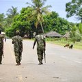 Soldiers from the Mozambican army patrol the streets after security in the area was increased, following a two-day attack from suspected islamists in October last year, on March 7, 2018 in Mocimboa da Praia, Mozambique.