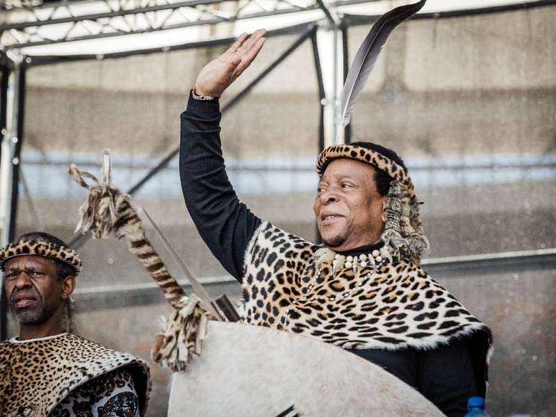 Zulu King Goodwill Zwelithini greets his supporters at The Moses Mabhida Football Stadium in Durban