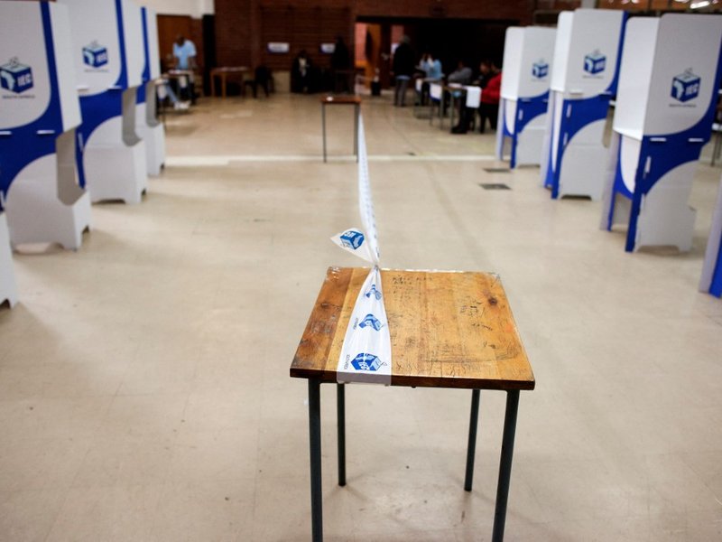 Tape of the Independent Electoral Commission (IEC) demarcates the polling station in the gang-ridden area of Bonteheuwel, Cape Town, on May 8, 2019, during South African general elections. IEC generic