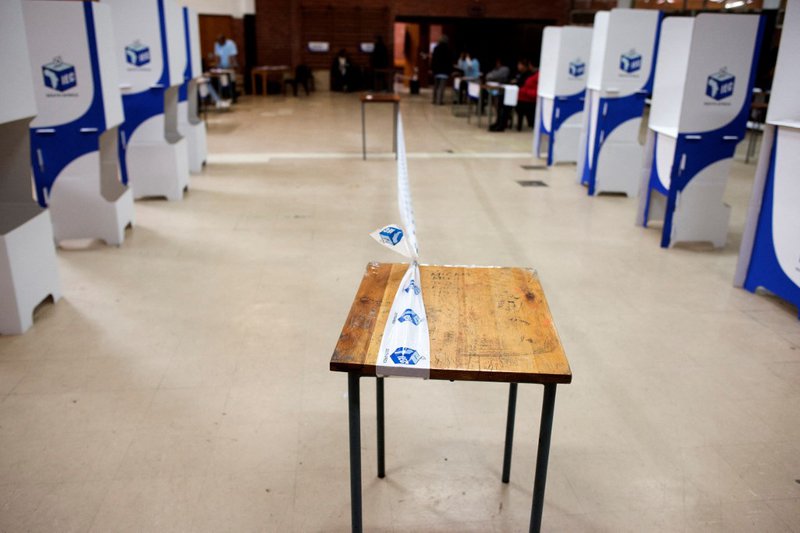 Tape of the Independent Electoral Commission (IEC) demarcates the polling station in the gang-ridden area of Bonteheuwel, Cape Town, on May 8, 2019, during South African general elections. IEC generic