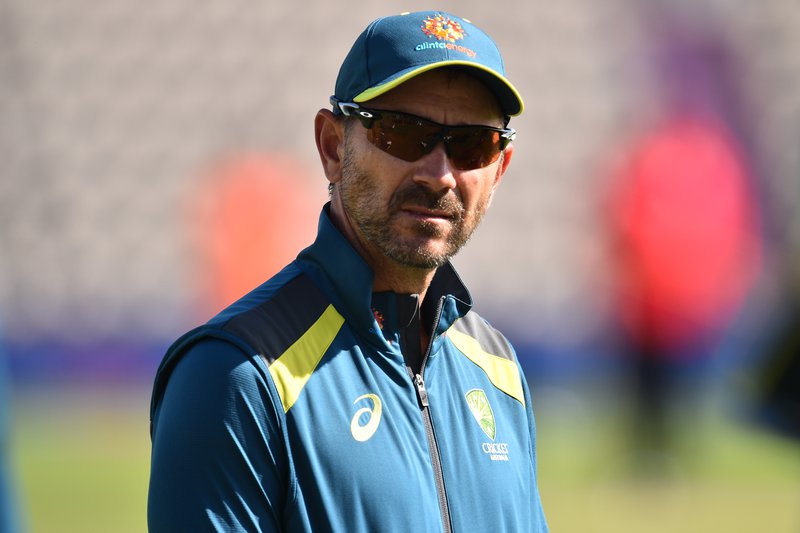 Australia's head coach Justin Langer joins his players during warm-up ahead of the 2019 Cricket World Cup warm up match between Australia and Sri Lanka at the Rose Bowl in Southampton, southern England, on May 27, 2019.  Glyn KIRK / AFP