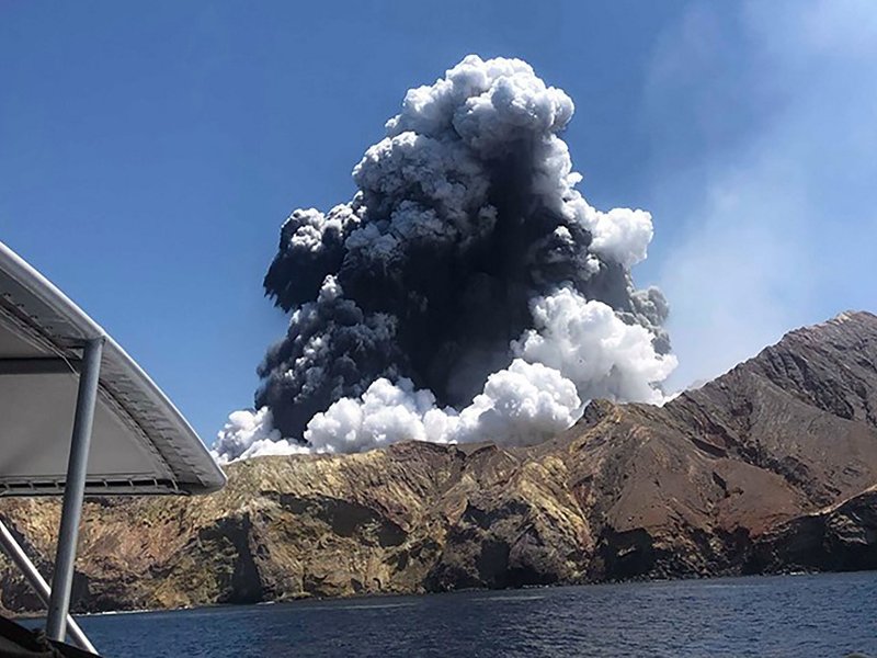 Courtesy of Lillani Hopkins through her Facebook account on December 12 shows a plume of ash rising into the air as the volcano on White Island erupts off the coast of Whakatane on New Zealand's North Island