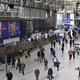 Commuters walk through a quiet Waterloo Station at 9.00am in the morning in London on March 17, 2020 after the UK government announced stricter measures and social distancing advice to deal with the novel coronavirus outbreak. Britain on Tuesday ramped up