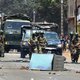 Guinean army forces patrol in the street in Conakry on March 22, 2020 during a constitutional referendum in the country. Guinean President Alpha Condé assured on March 21, 2020, that the constitutional referendum and legislative elections scheduled for Ma