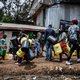 Residents queue with their jerrycan to fill them with free water distributed by the Kenyan government at Kibera slum in Nairobi, Kenya, on April 7, 2020. President Kenyatta announced the distribution of free water to low income communiites to curb the spr