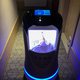 This photo taken on April 28, 2020 shows a robot capable of taking elevators and navigating hallways on its own delivering food to a guest at a quarantine hotel housing people from Hubei province in Beijing. As China gradually reopens domestic travel afte