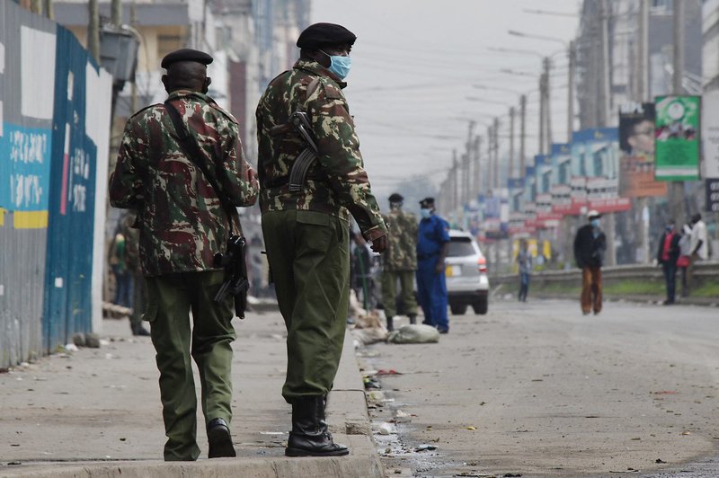 Kenyan police officers patrol in Eastleigh, Nairobi, on May 7, 2020, following the Kenyan government's announcement of partial lockdown in two COVID-19 coronavirus hotspots, Eastleigh in Nairobi and Mombasa City for at least 15-days, where there shall be