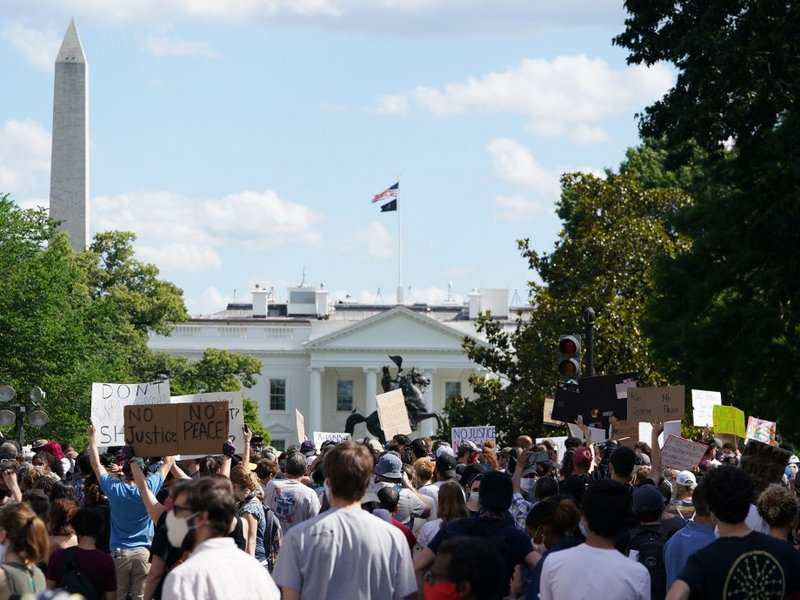 Demonstrators gather to protest the death of George Floyd, near the White House on May 31, 2020 in Washington, DC. Thousands of National Guard troops patrolled major US cities after five consecutive nights of protests over racism and police brutality that