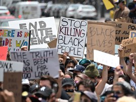 Demonstrators march through the streets of Hollywood, California, on June 2, 2020, to protest the death of George Floyd at the hands of police. Anti-racism protests have put several US cities under curfew to suppress rioting, following the death of George