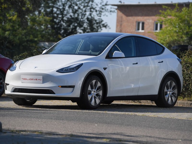 A picture taken on September 5, 2020 shows a "Tesla Model Y" car, an all-electric compact SUV by US electric car giant Tesla, during its presentation at the Automobile Club in Budapest.
