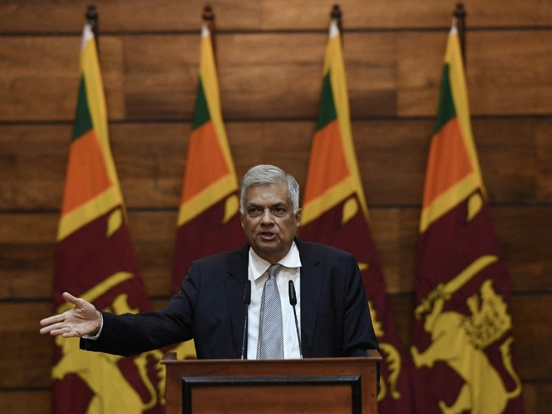 In this file photo taken on April 23, 2019, Sri Lanka's Prime Minister Ranil Wickremesinghe gestures as he answers questions during a press conference in Colombo. Wickremesinghe was sworn in as Sri Lanka's prime minister for the sixth time on May 12, 2022
