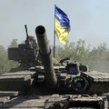 Ukrainian troop in a tank at the region of Donbas