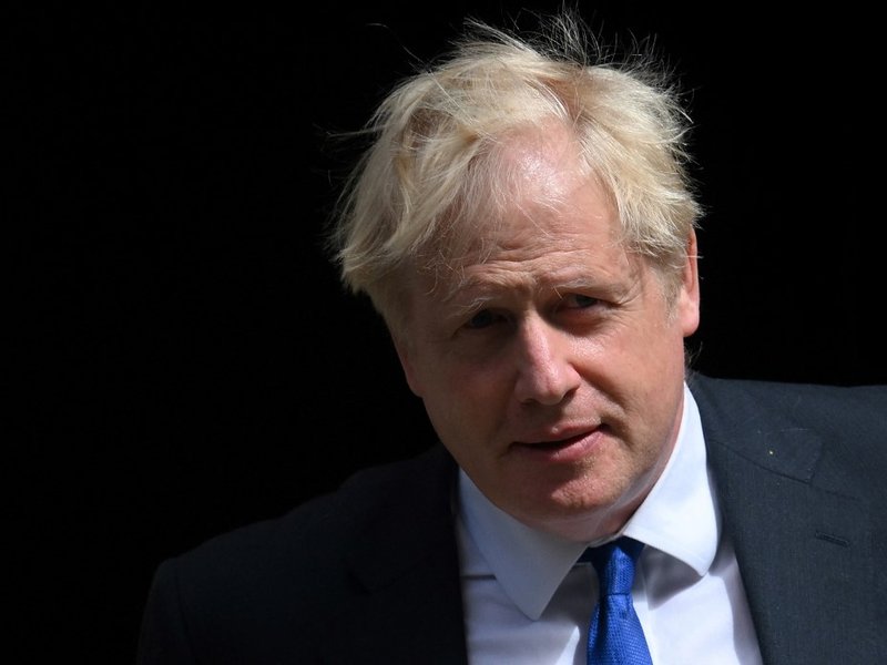 Britain's Prime Minister Boris Johnson walks to a waiting car as he leaves from 10 Downing Street in central London on July 6, 2022 to head to the Houses of Parliament for the weekly Prime Minister's Questions (PMQs) session. UK Prime Minister Boris Johns