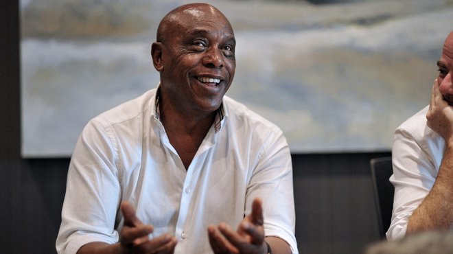 Tokyo Sexwale (L), South African businessman and former politician, and Gianni Infantino, general secretary of the European soccer federation UEFA, both candidates for the presidency of world football's governing body FIFA, address the media in Cape Town