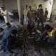 Security officials examine the site of a blast at a religious school in Peshawar on October 27, 2020. At least four students were killed and dozens more wounded on October 27 when a bomb exploded during a class at their religious school in Pakistan, offic