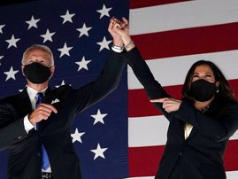 In this file photo taken on August 20, 2020 Former vice-president and Democratic presidential nominee Joe Biden (L) and Senator from California and Democratic vice presidential nominee Kamala Harris greet supporters outside the Chase Center in Wilmington,