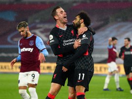 Liverpool Jordan Henderson Mohamed Salah - AFP