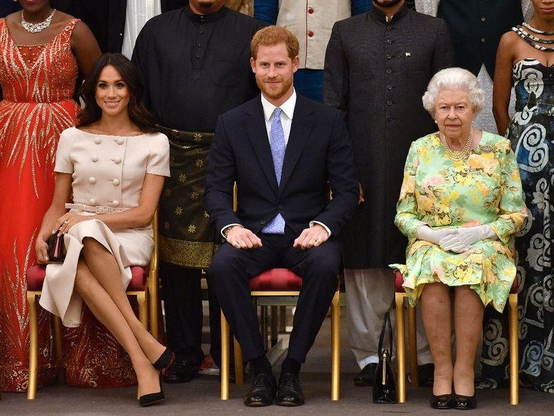 Queen Elizabeth Harry Meghan  - AFP