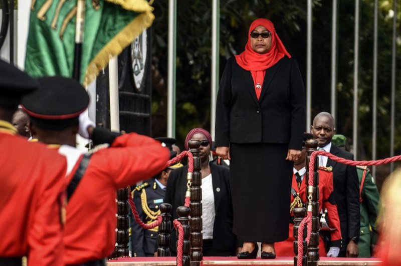 New Tanzanian President Samia Suluhu Hassan, inspects a military parade following her swearing in the country's first female President after the sudden death of President John Magufuli at statehouse in Dar es Salaam, Tanzania on March 19, 2021. Hassan, 61