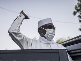 In this file photo taken on April 11, 2021 Chadian President Idriss Deby Itno greets supporters as he leaves after casting his ballot at a polling station in N'djamena. Chadian President Idriss Déby Itno, who has been in power for 30 years, died on April