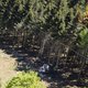 A photo taken and handout on May 23, 2021 by The Italian Firefighters "Vigili del Fuoco" shows a cable car that crashed to the ground in the resort town of Stresa on the shores of Lake Maggiore in the Piedmont region. 13 people died and two children were