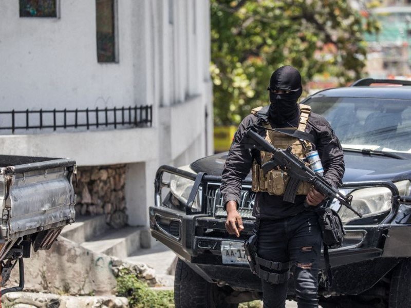 Police patrol the streets in Petionville, Haiti on July 9, 2021. A 28-member hit squad made up of Colombians and Americans murdered President Jovenel Moise, Haitian police say, but little is known about who masterminded the assassination and their motives