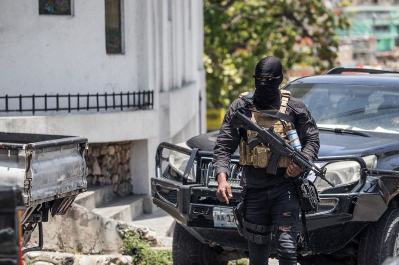 Police patrol the streets in Petionville, Haiti on July 9, 2021. A 28-member hit squad made up of Colombians and Americans murdered President Jovenel Moise, Haitian police say, but little is known about who masterminded the assassination and their motives