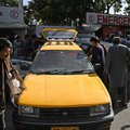 Relatives load in cars coffins of victims of the August 26 twin suicide bombs, which killed scores of people including 13 US troops outside Kabul airport, at a hospital in Kabul on August 27, 2021.