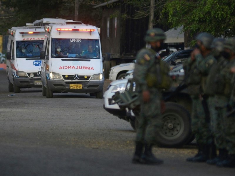 Members of the Ecuadorian Army stand guard outside a prison in Guayaquil, Ecuador, on September 29, 2021, after a riot occurred. Ecuador declared on Wednesday a state of exception for the prison system, in crisis due to overpopulation and violence between