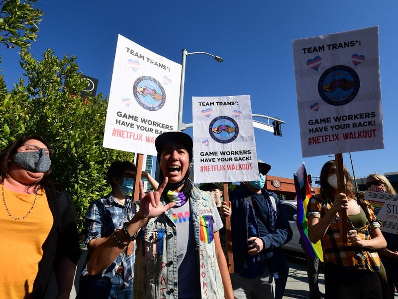 People rally in support of the Netflix transgender employee walkout in Los Angeles, California on October 20, 2021. Netflix bosses braced for the employee walkout and rally in Los Angeles as anger swelled over a new Dave Chappelle comedy special that acti