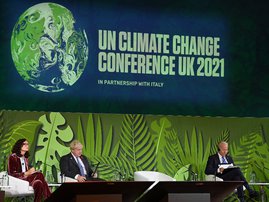Britain's Prime Minister Boris Johnson (2L), and US President Joe Biden (R) listen to a speaker during an Action on Forests and Land Use session, during the COP26 UN Climate Change Conference in Glasgow, Scotland on November 2, 2021. World leaders meeting