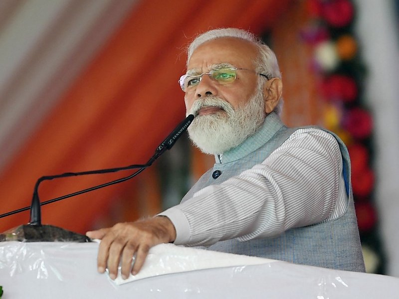 This handout photograph taken on November 16, 2021 and released by the Indian Press Information Bureau (PIB) shows Indian Prime Minister Narendra Modi speaking during the inauguration of the new Purvanchal Expressway during a touchdown operational exercis