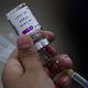 A nurse prepares a dose of the AstraZeneca vaccine against COVID-19 during the first day of the application of the third dose to people over 60 years-old at the Centro de Estudios Superiores Navales (CENCIS) in Mexico City, on December 7, 2021.