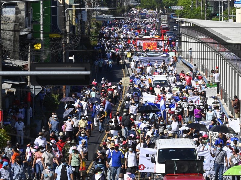 People demonstrate against Salvadoran President Nayib Bukele and for an independent judiciary in San Salvador, on December 12, 2021.