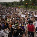 Protesters march on Hiawatha Avenue while decrying the killing of George Floyd on May 26, 2020 in Minneapolis, Minnesota. Four Minneapolis police officers have been fired after a video taken by a bystander was posted on social media showing Floyd's neck