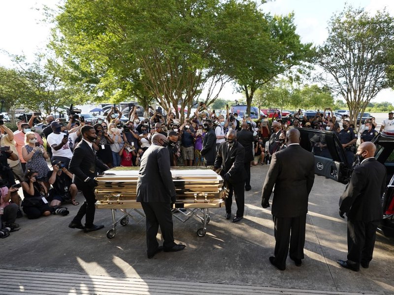 The casket of George Floyd is removed after a public visitation at the Fountain of Praise church on June 8, 2020 in Houston, Texas. Floyd died after being restrained by Minneapolis Police officers on May 25th.