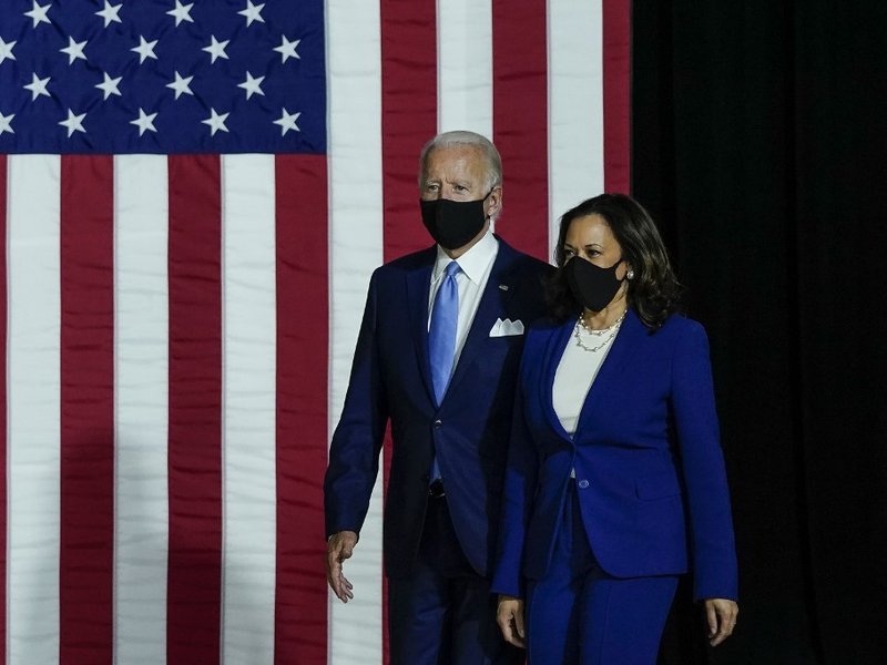 Presumptive Democratic presidential nominee former Vice President Joe Biden and his running mate Sen. Kamala Harris (D-CA) arrive to deliver remarks at the Alexis Dupont High School on August 12, 2020 in Wilmington, Delaware. Harris is the first Black wom