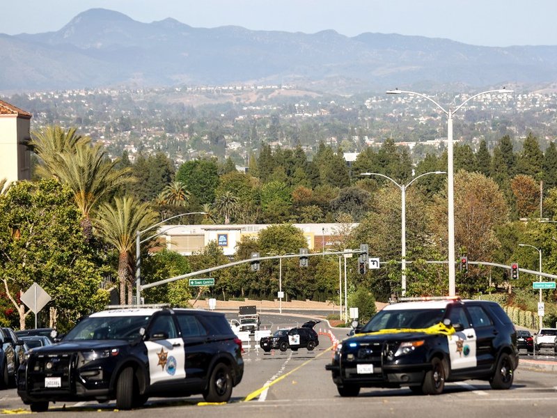 olice vehicles are parked near the scene of a shooting at the Geneva Presbyterian Church on May 15, 2022 in Laguna Woods, California. According to police, the shooting left one person dead, four critically wounded, and one with minor injuries.