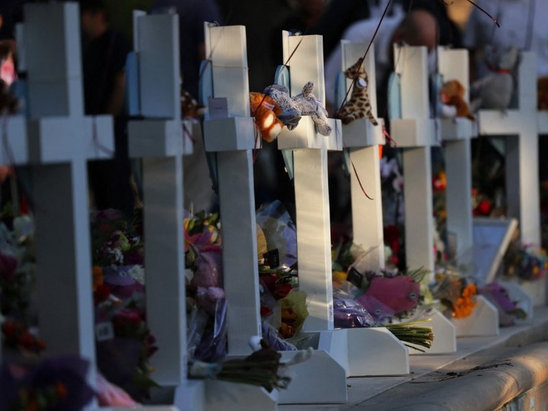 Memorials for victims of Tuesday's mass shooting at a Texas elementary school, in City of Uvalde Town Square on May 26, 2022 in Uvalde, Texas. Nineteen children and two adults were killed at Robb Elementary School after a man entered the school through an