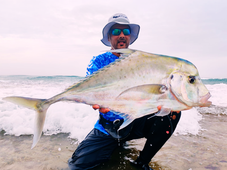 Dean Reddy with a massive Ragged Tooth shark (successfully released) caught on the north coast