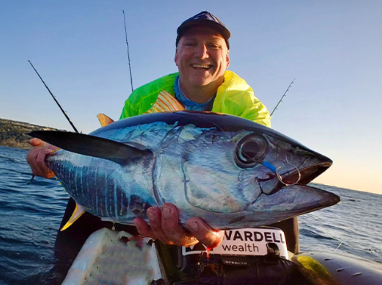 Jamie Wardell with a yellowfin tuna caught off a kayak on the north coast