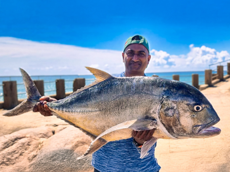 Micheal Govender stealing the show off Margate Pier with a majestic Giant Kingfish