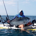 Shaun Reid with a 30kg Giant Kingfish caught off a kayak while fishing off Durban
