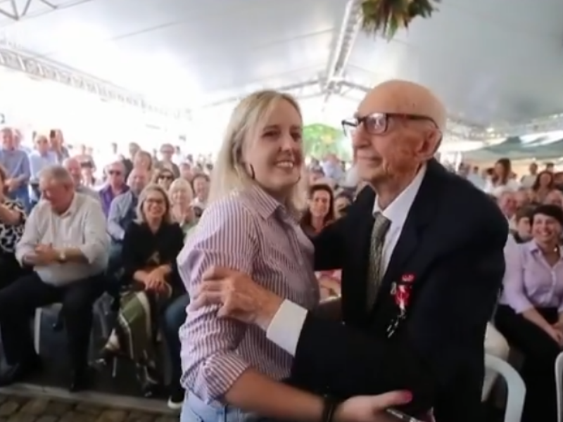 100-year-old man celebrating with a dance