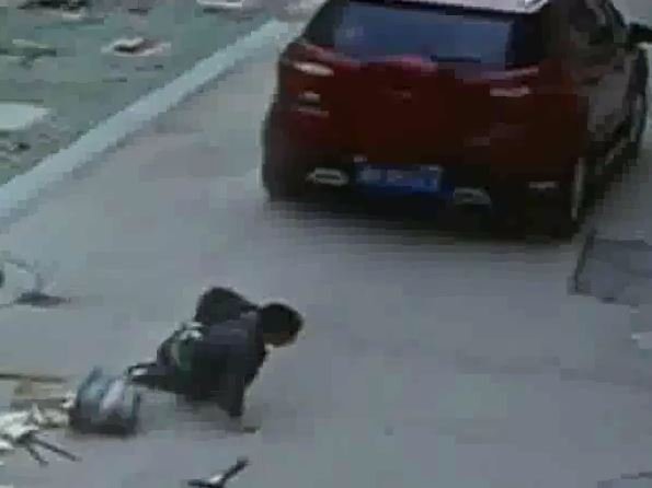 VIDEO: boy run over by car, stands up and walks!