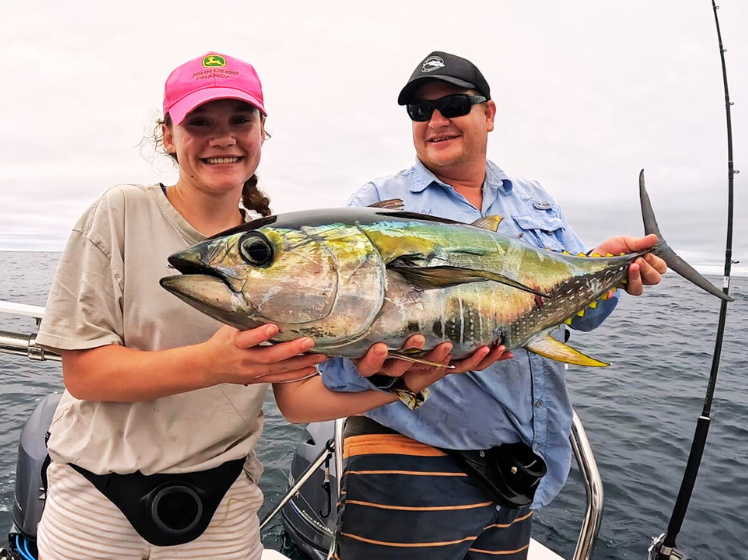 Grace Elliot and Lyle Taylor fishing off the Protea Banks with a Yellowfin Tuna