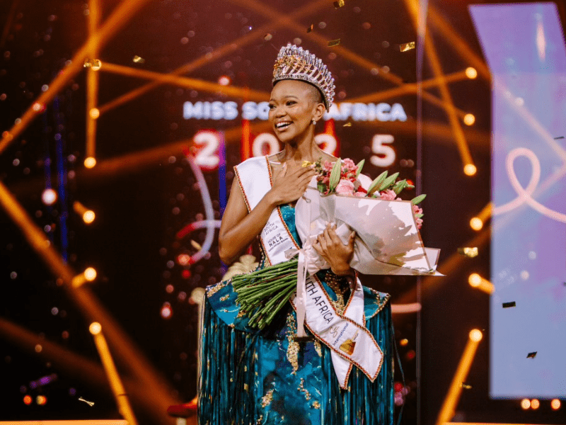 Qhawekazi Mazaleni holding a bouquet of flowers