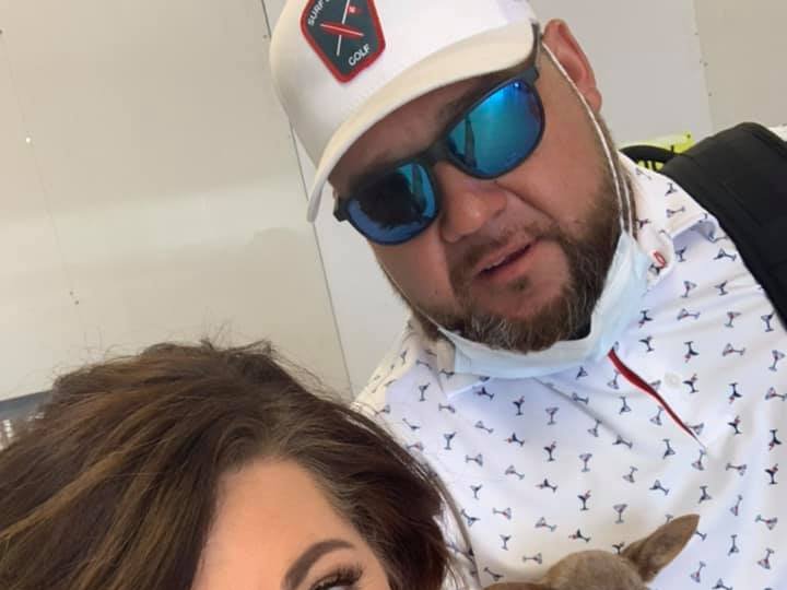 Couple discovers stowaway while checking in for flight