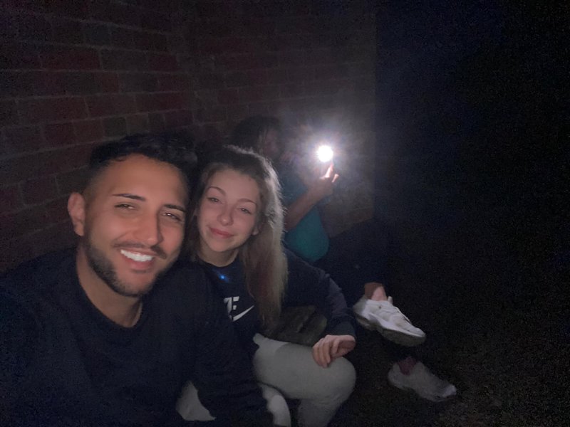Couple see strange face in picture ghost graveyard